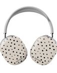 Front view of the Dotty Dream AirPods Max case, featuring a playful polka dot pattern on a beige-creme background, with a black Casetony logo.