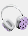 Side view of the Cosmic Giggles AirPods Max Case, showcasing the lavender background with black crescent patterns and a sleek, protective fit.