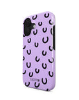 Front and side view of the Cosmic Giggles Tough iPhone case, showcasing its purple, playful design and sleek, dual-layer protection with a black Casetony logo.