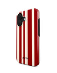 Front and side view of Festive Bauble Tough iPhone Case showcasing its vibrant ornament design and reinforced edges for enhanced protection and festive style.